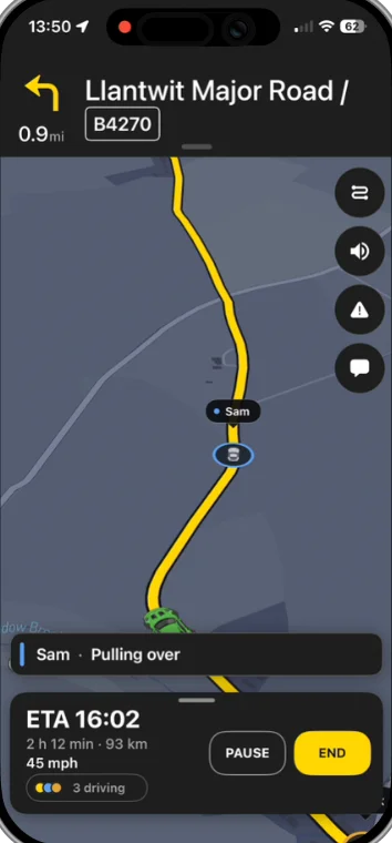 Turn-by-turn navigation with a convoy member's car and status shown on the map